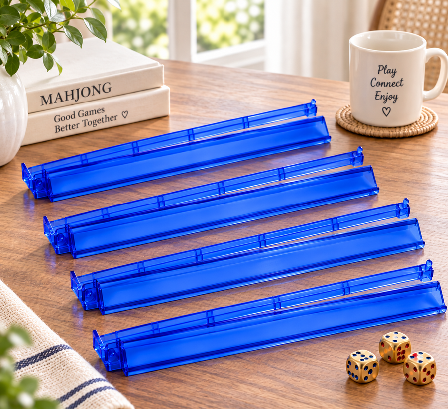 Four blue integrated Mahjong rack-and-pusher units arranged on a tabletop