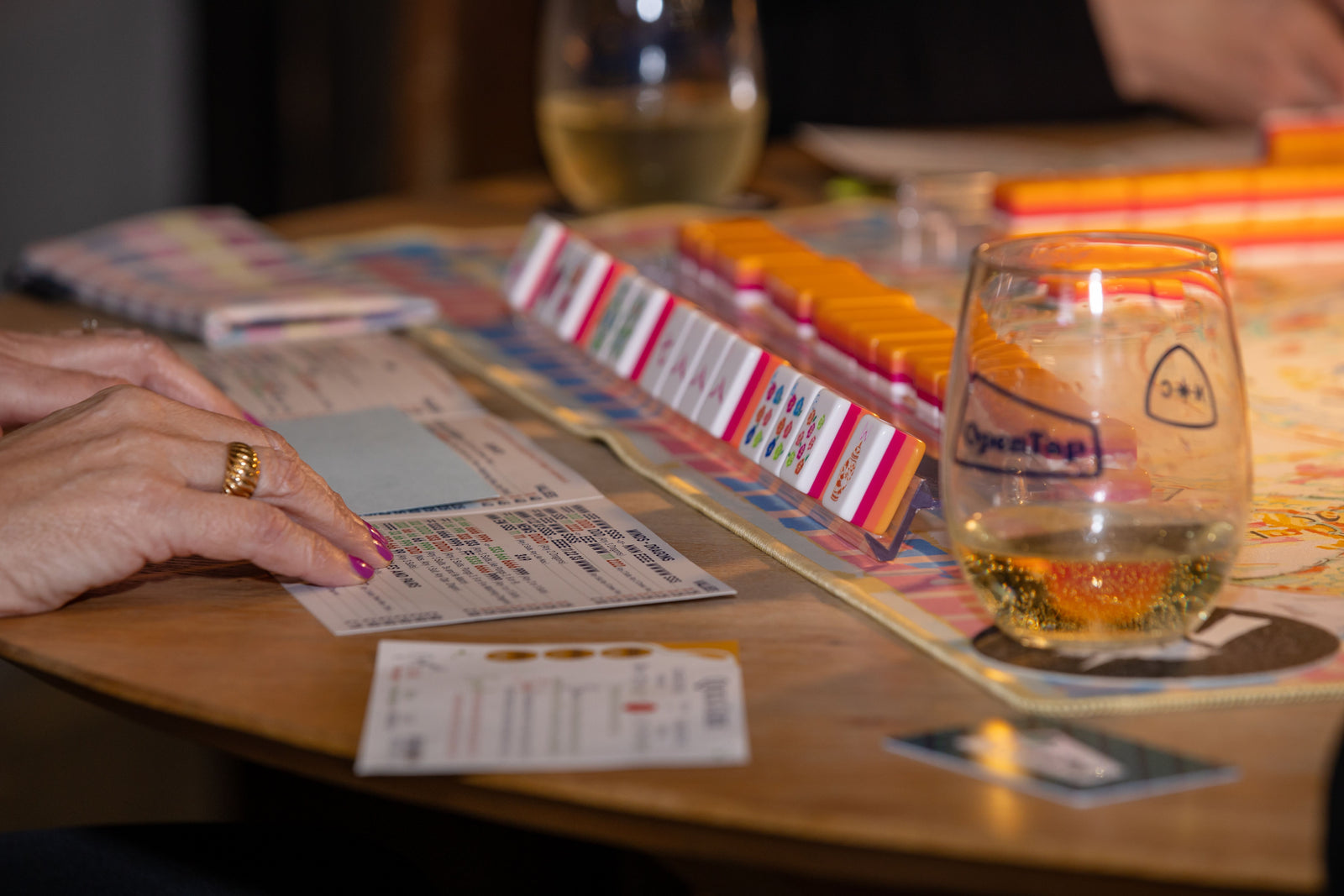 Friends enjoying a cozy Mahjong game night